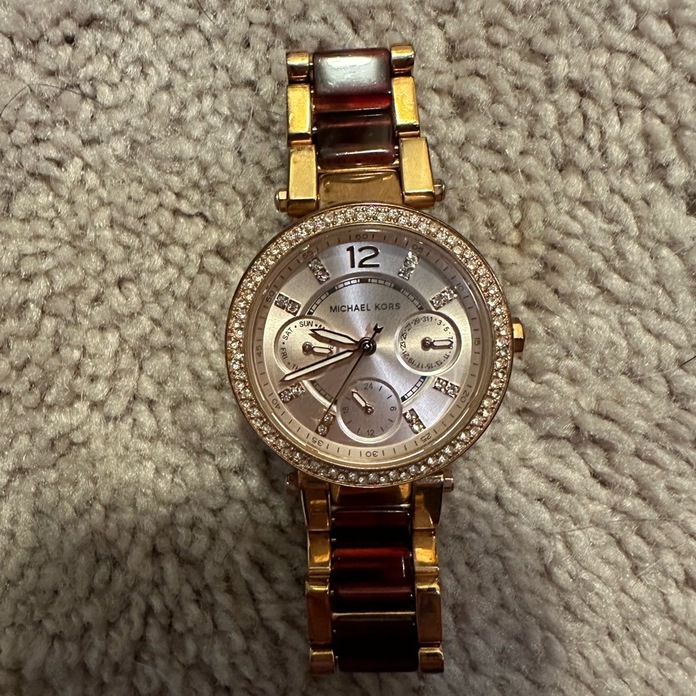 Michael Kors watch - rose gold and burgundy band.